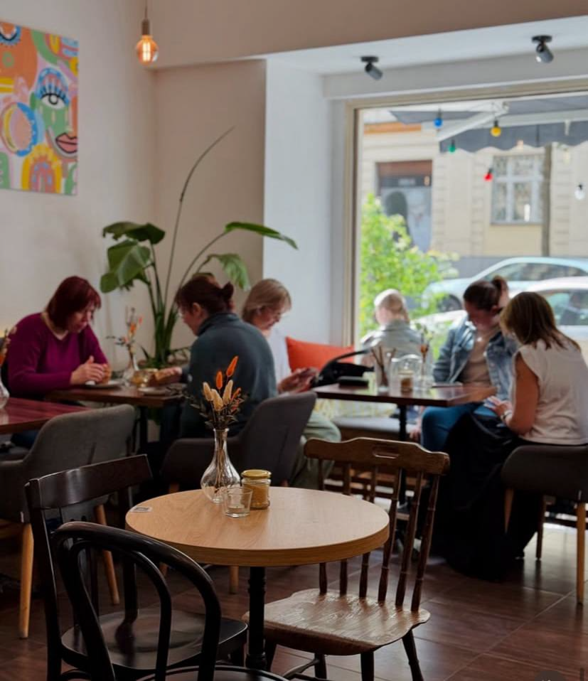 Café interior with guests
